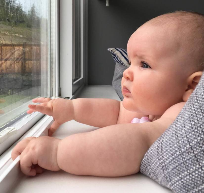 Becoming a Grandparent: Jordyn at Window